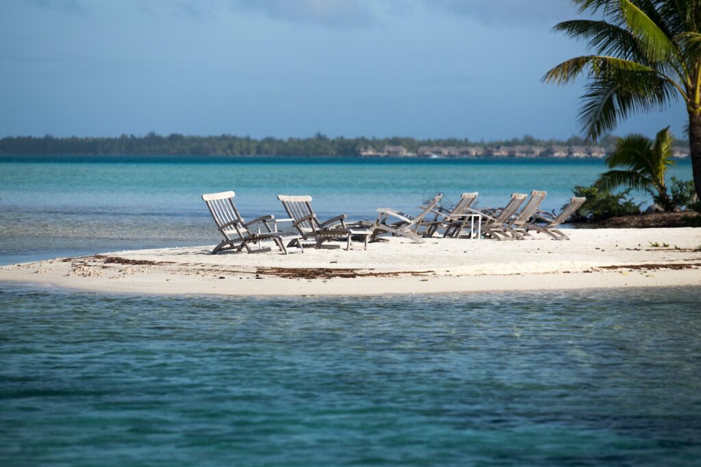 Wanderlust Alert! Discover the Most Captivating Locations, gray pool lounge chair in island