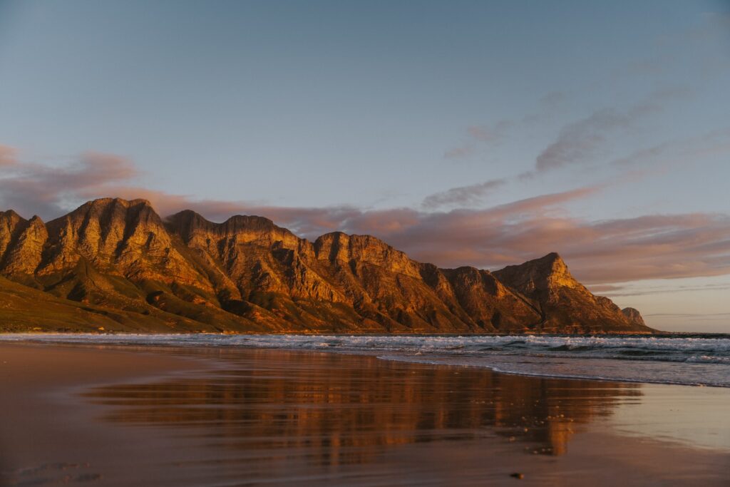 Sandy Bay: a beach with a mountain in the background