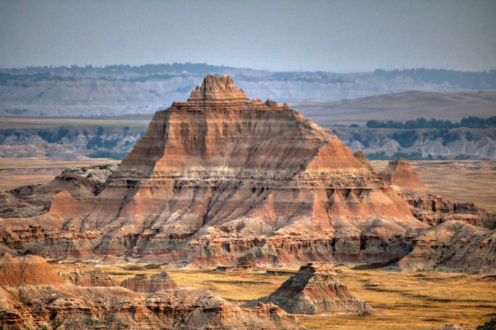 South Dakota: brown rock formation near body of water during daytime