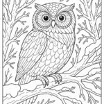 Owl perched on frozen tree branch